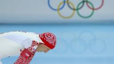 FILE PHOTO: Ivan Skobrev of Russia reacts after his men's 5000 meters speed skating race during the 2014 Sochi Winter Olympics