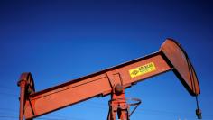 FILE PHOTO: An oil well pump jack is seen at an oil field supply yard near Denver, Colorado, U.S., February 2, 2015.   REUTERS/Rick Wilking/File Photo 