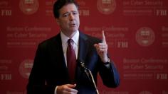 FILE PHOTO: FBI Director James Comey speaks at the Boston Conference on Cyber Security at Boston College in Boston, Massachusetts, U.S., March 8, 2017. REUTERS/Brian Snyder/File Photo