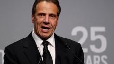 New York Governor Andrew Cuomo speaks during the commemoration of the Elton John AIDS Foundation 25th year fall gala at the Cathedral of St. John the Divine in New York City, in New York