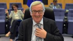 FILE PHOTO: European Commission President Jean-Claude Juncker gestures before a meeting of the College of Commissioners at the European Commission in Brussels, Belgium July 26, 2017. REUTERS/Eric Vidal 