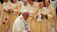 Pope Francis arrives to lead a mass to mark the World Day of Peace in Saint Peter's Basilica at the Vatican