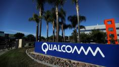 FILE PHOTO: A sign on the Qualcomm campus is seen in San Diego, California, U.S. November 6, 2017. REUTERS/Mike Blake/File Photo  