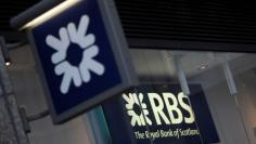 Royal Bank of Scotland signs are seen at a branch of the bank, in London, Britain December 1, 2017.  REUTERS/Peter Nicholls