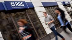 People walk past a branch of The Royal Bank of Scotland (RBS) in central London August 27, 2014. REUTERS/Toby Melville