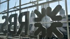 FILE PHOTO: The City of London business district is seen through windows of the Royal Bank of Scotland (RBS) headquarters in London, Britain September 10, 2015. REUTERS/Toby Melville/File Photo 