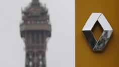 The logo of French car manufacturer Renault is seen at a dealership in Paris