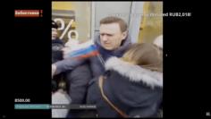 A still image taken from a video footage shows Russian opposition leader Alexei Navalny being detained by Interior Ministry members during a rally for a boycott of a March 18 presidential election in Moscow, Russia January 28, 2018. NAVALNY.COM/Handout/R