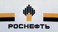 FILE PHOTO - The logo of Russia's Rosneft oil company is pictured at the central processing facility of the Rosneft-owned Priobskoye oil field outside the West Siberian city of Nefteyugansk