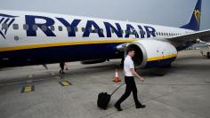 A pilot disembarks a Ryanair flight at Stansted airport in London, Britain September 27, 2017. REUTERS/Clodagh Kilcoyne