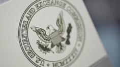 FILE PHOTO - The U.S. Securities and Exchange Commission logo adorns an office door at the SEC headquarters in Washington, June 24, 2011. REUTERS/Jonathan Ernst