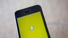 A portrait of the Snapchat logo in Ventura, California December 21, 2013. REUTERS/Eric Thayer/File Photo 