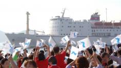 NORTH KOREAN FERRY WELCOMED AT SOUTH KOREAN PORT IN BUSAN.