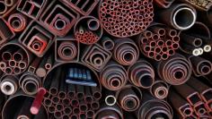 A pocket calculator is seen on steel products at a steel works in Seoul October 23, 2012.   REUTERS/Kim Hong-Ji/File Photo     GLOBAL BUSINESS WEEK AHEAD PACKAGE - SEARCH 'BUSINESS WEEK AHEAD 27 NOV'  FOR ALL IMAGES - RC1FAC332C10