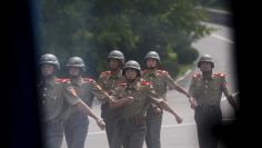 North Korean soldiers patrol at the truce village of Panmunjom