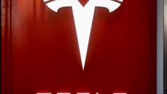 The Tesla logo is seen at the entrance to Tesla Motors' new showroom in Manhattan's Meatpacking District in New York City, U.S., December 14, 2017. REUTERS/Brendan McDermid