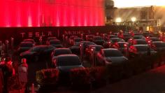 FILE PHOTO: Tesla Model 3 cars wait for their new owners as they come off the Fremont factory's production line during an event at the company's facilities in Fremont