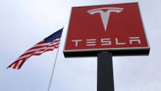 FILE PHOTO: A Tesla charging station is seen in Salt Lake City, Utah, U.S. on September 28, 2017. REUTERS/Lucy Nicholson/File Photo