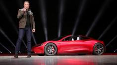 Tesla CEO Elon Musk unveils the Roadster 2 during a presentation in Hawthorne, California, U.S., November 16, 2017. Tesla/Handout via REUTERS  