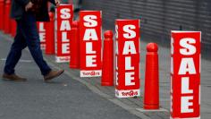 FILE PHOTO: Sale signs are seen at the Toys "R" Us store, in Hayes, Britain December 2, 2017.  REUTERS/Peter Nicholls/File Photo