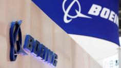 FILE PHOTO: Boeing's logo is seen during Japan Aerospace 2016 air show in Tokyo, Japan, October 12, 2016.   REUTERS/Kim Kyung-Hoon/File Photo