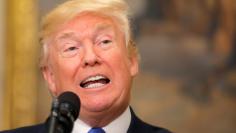 FILE PHOTO: U.S. President Donald Trump speaks during an announcement on immigration reform in the Roosevelt Room of the White House in Washington, U.S., August 2, 2017. REUTERS/Carlos Barria/File Photo