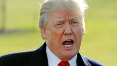 FILE PHOTO: U.S. President Trump speaks to members of the press in Washington