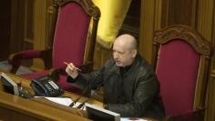 Newly elected speaker of parliament Oleksander Turchynov attends a session of the Ukrainian parliament in Kiev