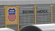 A Union Pacific rail car is parked at a Burlington National Santa Fe (BNSF) train yard in Seattle