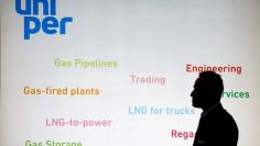 FILE PHOTO: The logo of Uniper SE is seen in its booth at Gastech, the world's biggest expo for the gas industry, in Chiba, Japan April 4, 2017. REUTERS/Toru Hanai/File Photo    