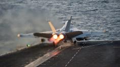 An EA-18G Growler launches from the Nimitz-class aircraft carrier USS Carl Vinson (CVN 70) in this U.S. Navy picture taken in the Arabian Gulf October 28, 2014. REUTERS/U.S. Navy/Mass Communication Specialist 2nd Class John Philip Wagner Jr./Handout via R