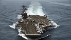 The aircraft carrier USS Theodore Roosevelt operates in the Arabian Sea conducting maritime security operations
