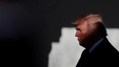 U.S. President Donald Trump prepares to address the annual March for Life rally, taking place on the National Mall, from the White House Rose Garden in Washington, U.S., January 19, 2018. REUTERS/Carlos Barria