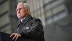 FILE PHOTO: U.S. Vice President Mike Pence speaks to troops in a hangar at Bagram Air Field in Afghanistan on December 21, 2017. REUTERS/Mandel Ngan/Pool