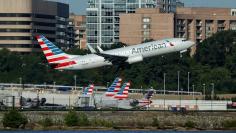 An American Airlines jet takes off from Washington National Airport in Washington