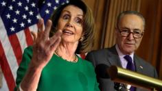 U.S. House Minority Leader Nancy Pelosi (D-CA) speaks next to Senate Minority Leader Chuck Schumer (D-NY) during a news conference on President Trump's first 100 days on Capitol Hill in Washington, U.S April 28, 2017. REUTERS/Yuri Gripas