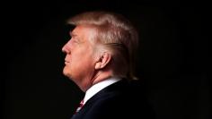 Republican U.S. presidential candidate Donald Trump poses for a photo after an interview with Reuters in his office in Trump Tower, in the Manhattan borough of New York City