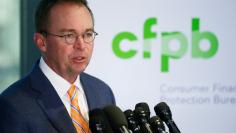 FILE PHOTO: Office of Management and Budget (OMB) Director Mick Mulvaney speaks to the media at the U.S. Consumer Financial Protection Bureau (CFPB), where he began work earlier in the day after being named acting director by U.S. President Donald Trump 