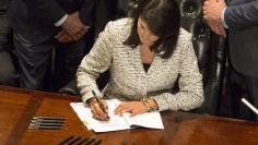 South Carolina Governor Haley signs legislation permanently removing the Confederate battle flag from the state capitol grounds in Columbia