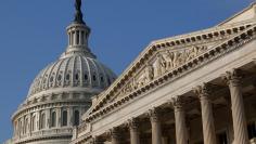 FILE PHOTO: The U.S. Capitol Dome (L) building is pictured in Washington, DC, U.S. on October 4, 2013.  REUTERS/Jonathan Ernst/File Photo