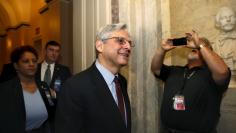 U.S. Supreme Court nominee Judge Merrick Garland walks after a breakfast with Senate Judiciary Committee Chair Senator Chuck Grassley (R-IA) on Capitol Hill Washington, April 12, 2016. REUTERS/Yuri Gripas