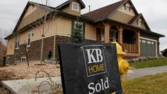 A sold sign is seen outside a house built by KB Home in Golden, Colorado, United States October 27, 2009.   REUTERS/Rick Wilking/File Photo 