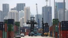 FILE PHOTO - A mule truck moves a container in the Port of Miami in Miami, Florida, U.S., May 19, 2016.    REUTERS/Carlo Allegri/File Photo          