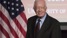 Former U.S. President Jimmy Carter arrives to speak during an event honoring former U.S. Vice President Walter Mondale hosted by the Humphrey School of Public Affairs at the University of Minnesota in Washington October 20, 2015. REUTERS/Joshua Roberts 