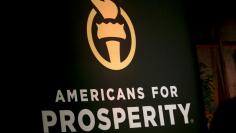 FILE PHOTO: An Americans for Prosperity banner is seen during an event in Manchester, New Hampshire, July 22, 2015.  REUTERS/Dominick Reuter 