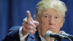File photo of U.S. Republican presidential candidate Donald Trump taking a question from the audience at one of the New England Council's "Politics and Eggs' breakfasts in Manchester