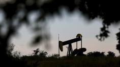 An oil pump jack can be seen in Cisco, Texas, August 23, 2015.  REUTERS/Mike Stone