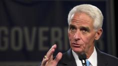 Former Florida Governor and Democratic gubernatorial candidate Charlie Crist talks with supporters after conceding in the midterm elections in St. Petersburg, Florida November 4, 2014.  REUTERS/Scott Audette 