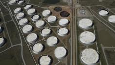 Crude oil storage tanks are seen from above at the Cushing oil hub, in Cushing, Oklahoma, March 24, 2016.  REUTERS/Nick Oxford