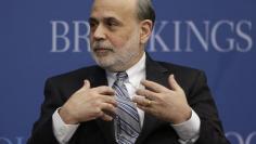 Outgoing U.S. Federal Reserve Board Chairman Ben Bernanke participates in a discussion at the Brookings Institution in Washington in this January 16, 2014 file photo.    REUTERS/Gary Cameron 